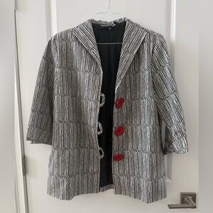 Vintage painted pony, black and white striped blazer with large red buttons
